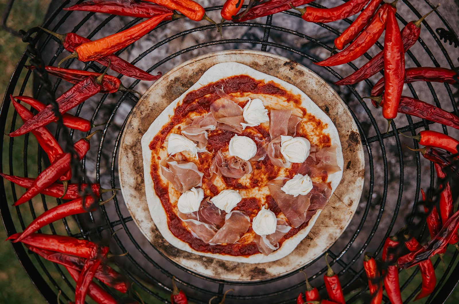 Chilli proscuitto pizza by Kelly Wilde